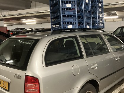 Carolien Adriaansche Transport new crates at the Hague Market.