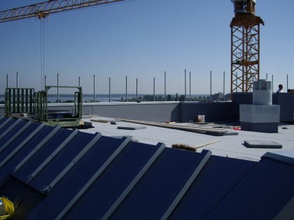 Zinken daken voor De Oude Haven in Huizen