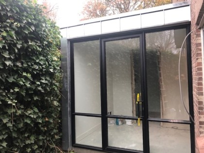 Traditionele gevelbekleding van zink of koper