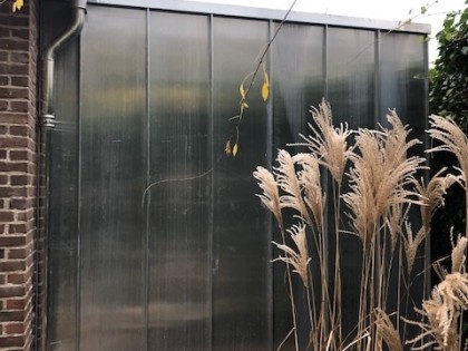 Traditionele gevelbekleding van zink of koper