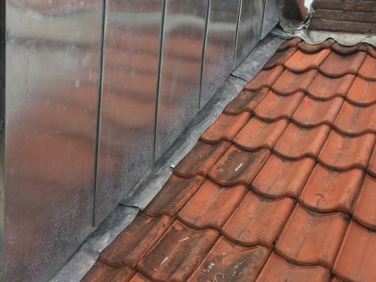 Traditionele gevelbekleding van zink of koper