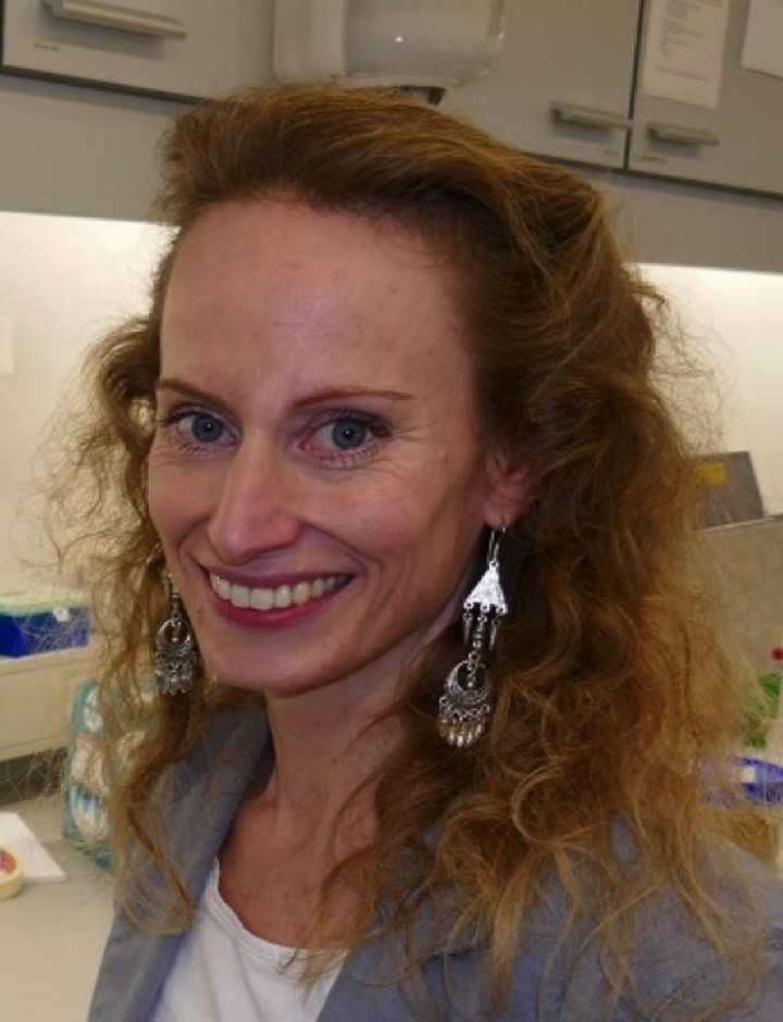Dr. Vivi Heine