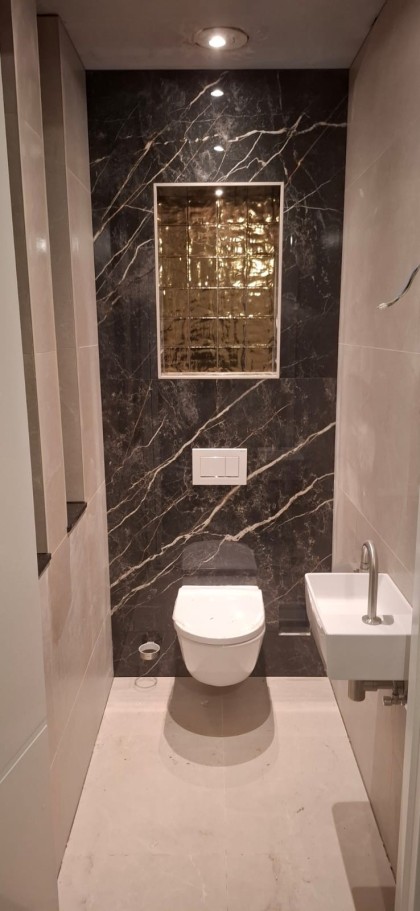 Toilet afbouw Tegelwerken Erwin Bout