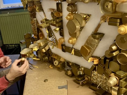 De Afvaljuf - workshop bedrijfslogo van plastic afval