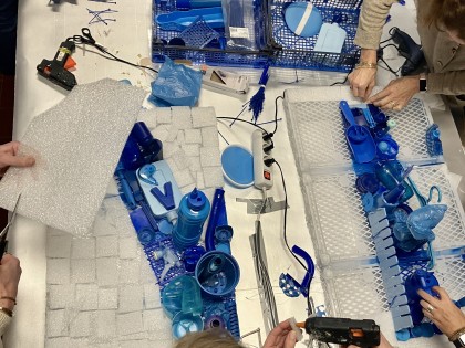 De Afvaljuf - Bedrijfslogo van plastic afval