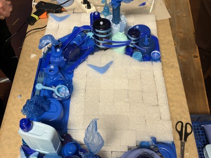 De Afvaljuf - Bedrijfslogo van plastic afval